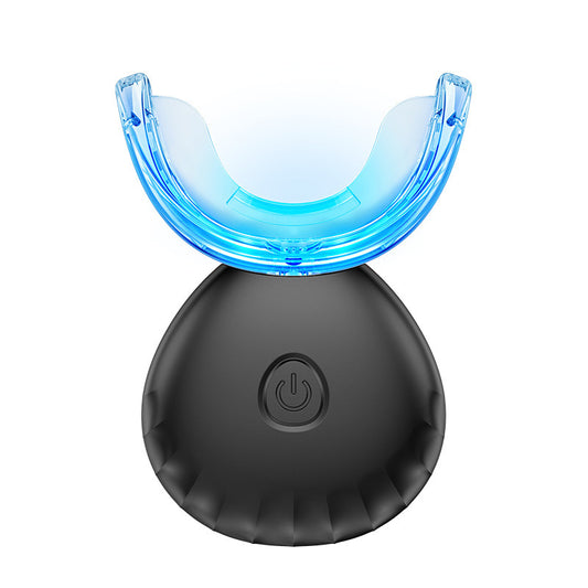 Black dental device with blue light on a white background

